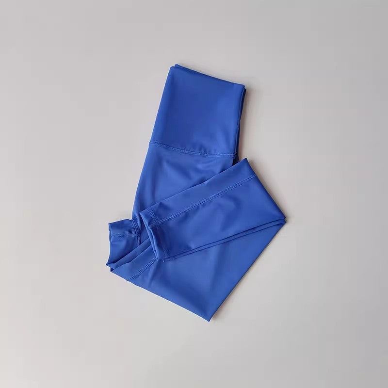 Combinaison fitness femme — dos Nu avec blocs de couleurs