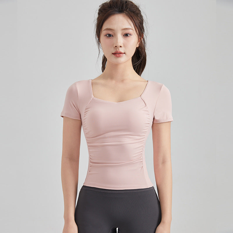 Haut de yoga à manches courtes — soutien-gorge rembourré pour un confort optimal