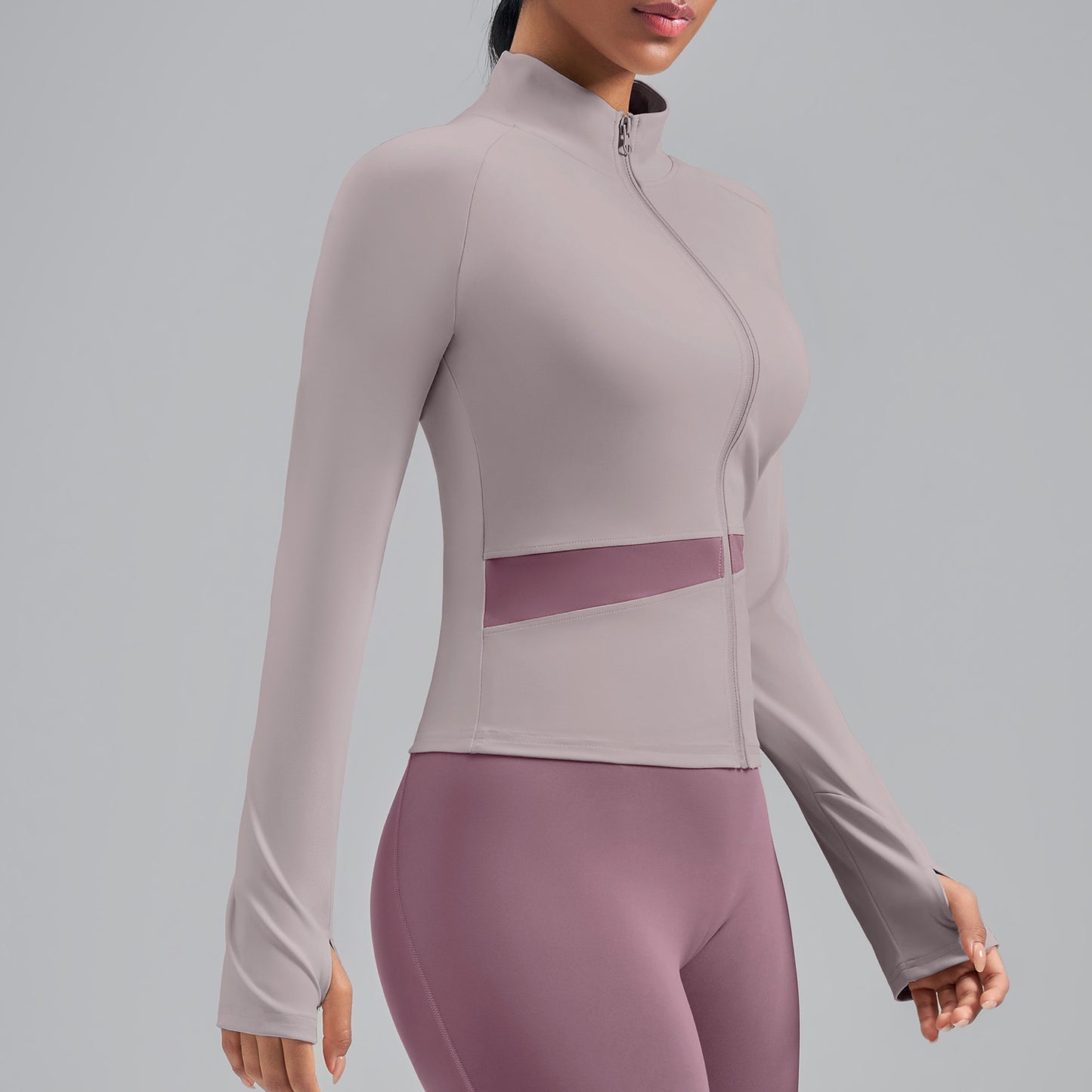 Veste de yoga bicolore à empiècements croisés — haut de sport effet chair