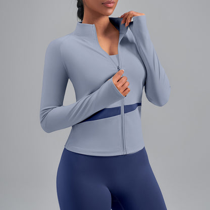 Veste de yoga bicolore à empiècements croisés — haut de sport effet chair