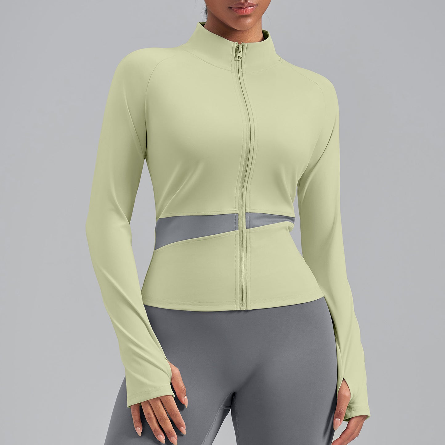 Veste de yoga bicolore à empiècements croisés — haut de sport effet chair