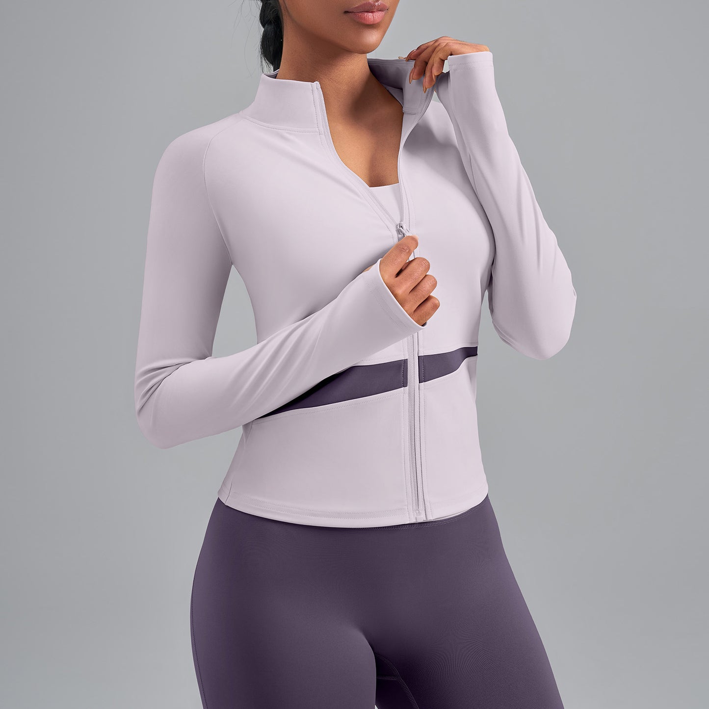 Veste de yoga bicolore à empiècements croisés — haut de sport effet chair